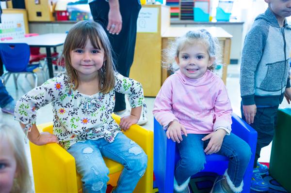 Students inside their classrooms learning. 
